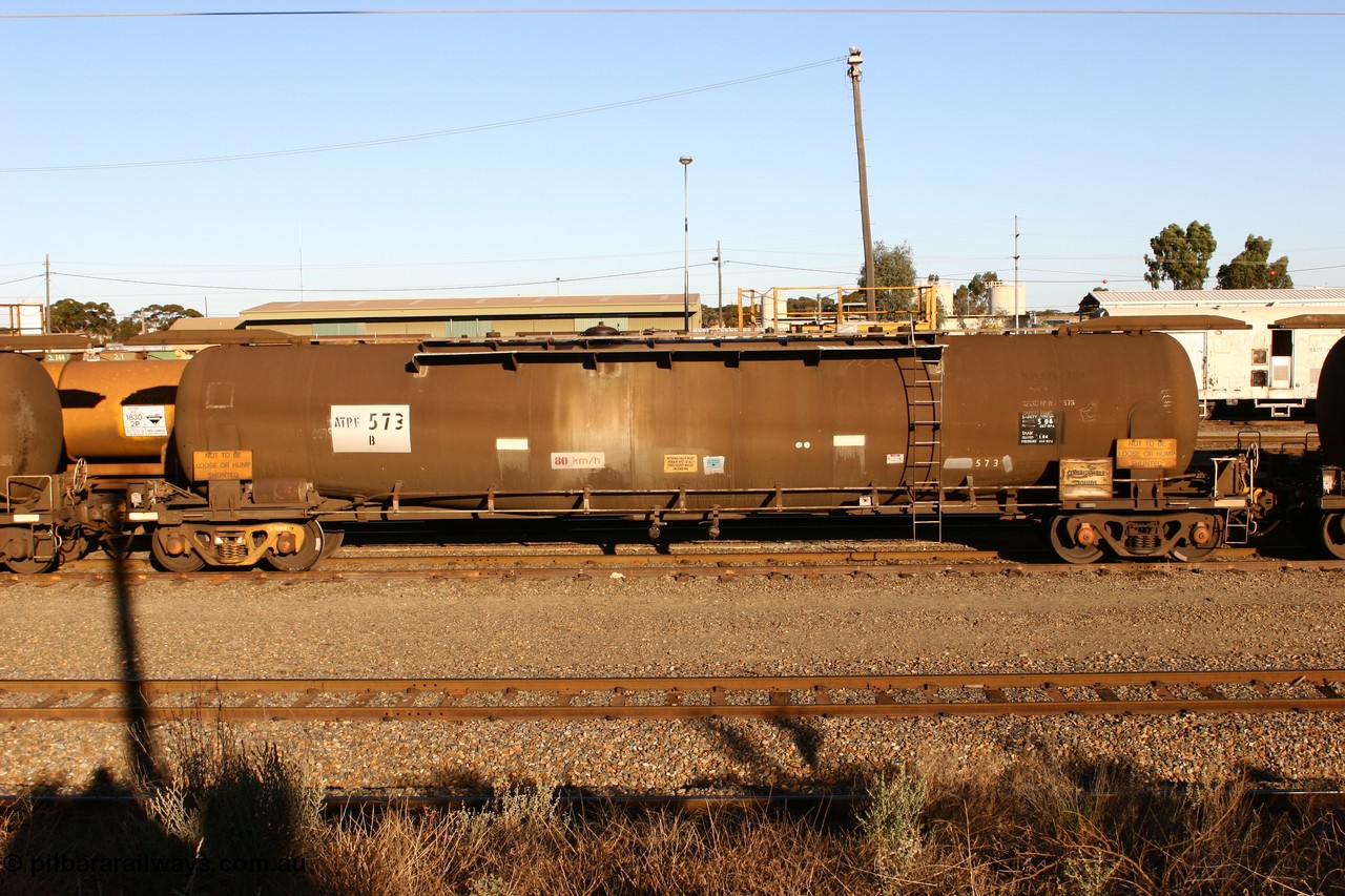 060528 4637 ATPF573B
West Kalgoorlie, ATPF 573 fuel tank waggon built by WAGR Midland Workshops 1974 for Shell as WJP type 80.66 kL one compartment one dome, capacity of 80500 litres, Shell Fleet No. 708.
Keywords: ATPF-type;ATPF573;WAGR-Midland-WS;WJP-type;