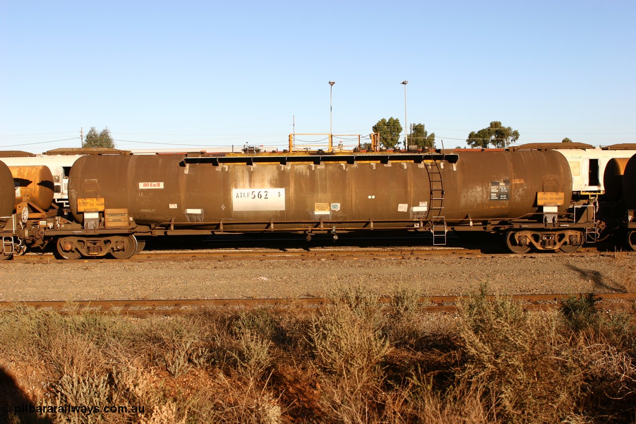 060528 4639 ATLF562S
West Kalgoorlie, ATLF 562 tank waggon, built by WAGR Midland Workshops 1973 for Shell as type WJL 86.49 kL one compartment one dome with a capacity of 80500 litres, fitted with type F InterLock couplers.
Keywords: ATLF-type;ATLF562;WAGR-Midland-WS;WJL-type;