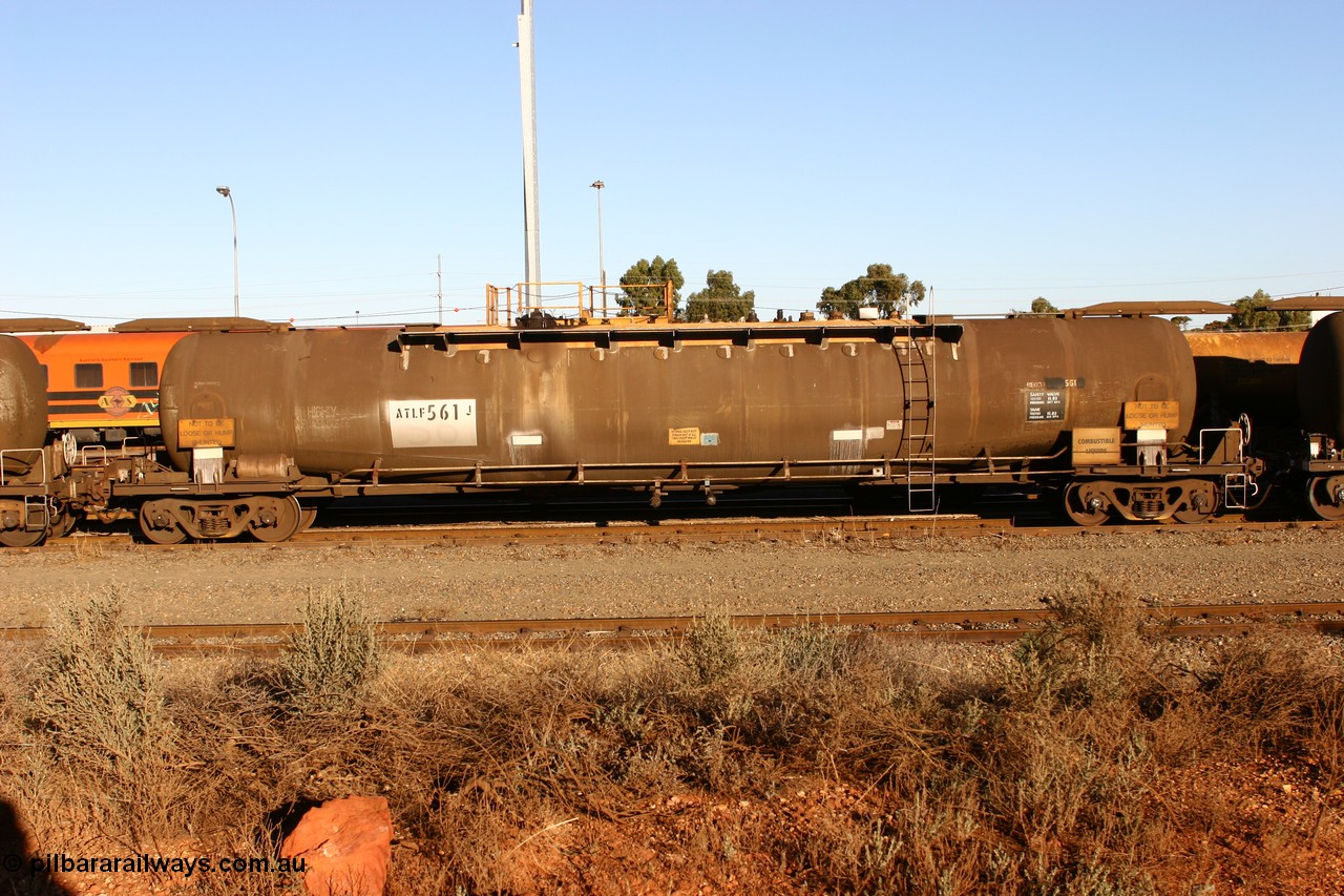 060528 4641 ATLF561J
West Kalgoorlie, ATLF 561 fuel tank waggon, built by WAGR Midland Workshops 1973 for Shell as type WJL 86.49 kL one compartment one dome with a capacity of 80500 litres
Keywords: ATLF-type;ATLF561;WAGR-Midland-WS;WJL-type;