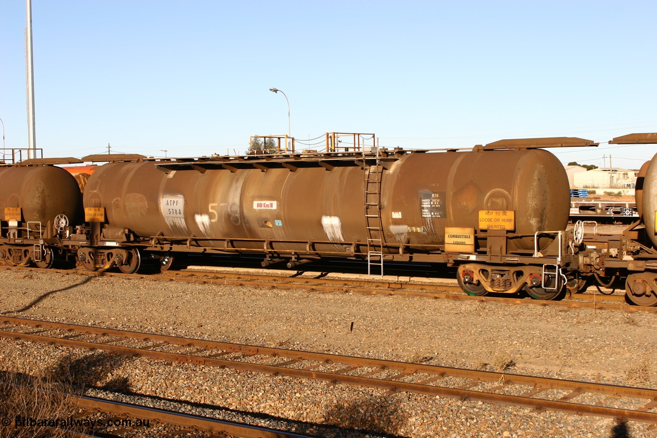 060528 4642 ATPF578A
West Kalgoorlie, ATPF 578 fuel tank waggon, originally built by WAGR Midland Workshops in 1974 for Shell as type WJP, it also spent time in SA in 1985, 80.66 kL one compartment one dome, capacity of 80350 litres, fitted with type F InterLock couplers.
Keywords: ATPF-type;ATPF578;WAGR-Midland-WS;WJP-type;