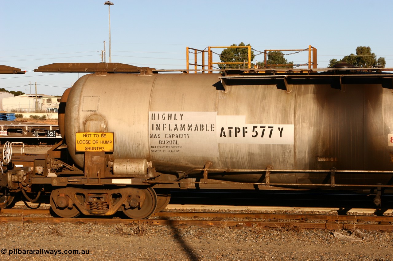 060528 4643 ATPF577Y
West Kalgoorlie, ATPF 577 fuel tank waggon built by WAGR Midland Workshops 1974 for Shell as type WJP, 80.66 kL one compartment one dome, capacity of 80500 litres, fitted with type F InterLock couplers Shell Fleet no. TR712.
Keywords: ATPF-type;ATPF577;WAGR-Midland-WS;WJP-type;