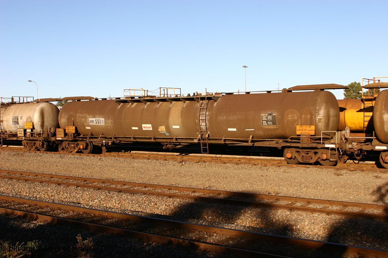 060528 4645 ATMF551E
West Kalgoorlie, ATMF 551 fuel tank waggon, one of three built by Tulloch Limited NSW as WJM type in 1971 with a capacity of 96.25 kL one compartment one dome, current capacity of 80500 litres. 551 and 552 for Shell and 553 for BP Oil.
Keywords: ATMF-type;ATMF551;Tulloch-Ltd-NSW;WJM-type;