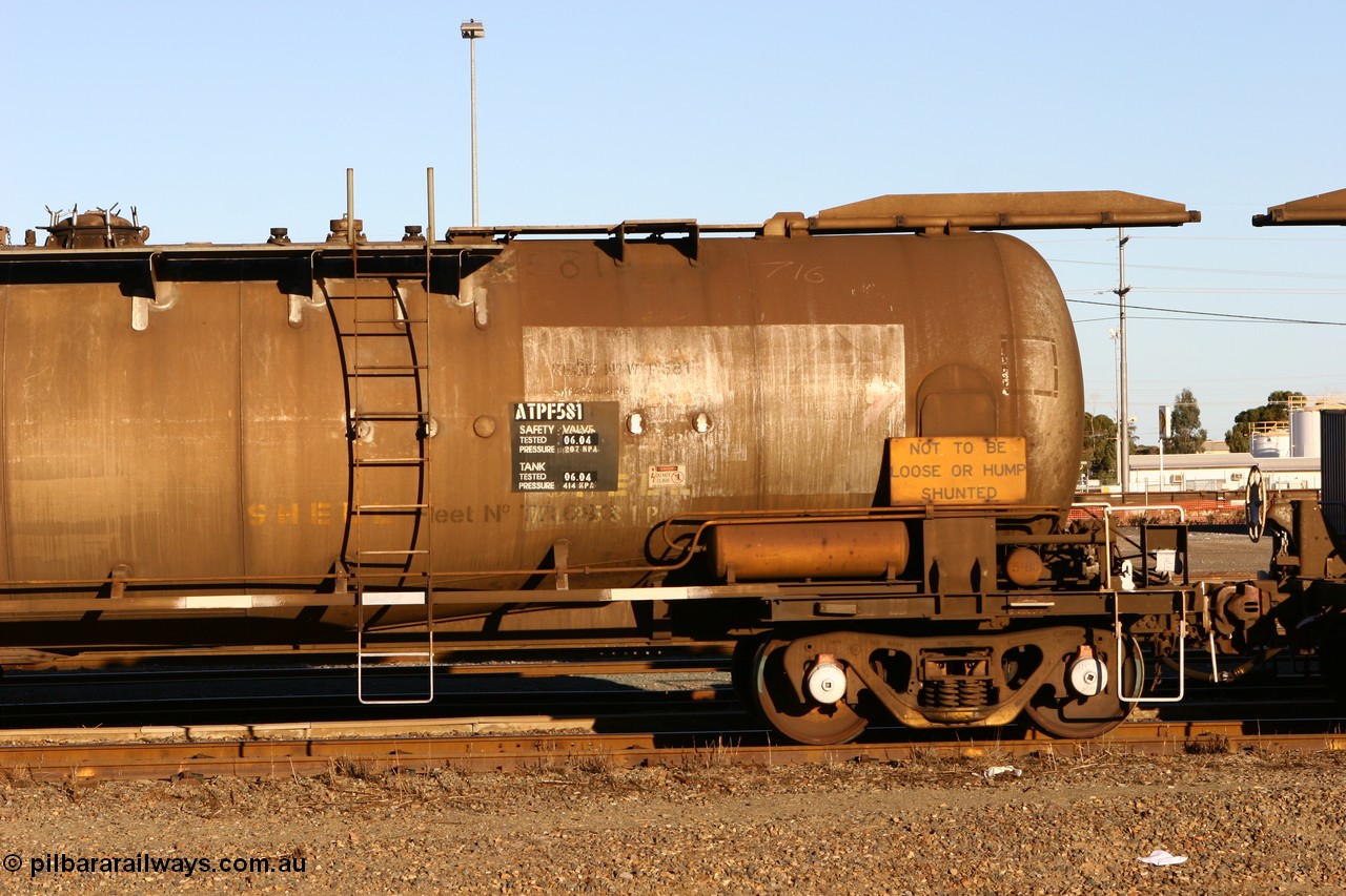 060528 4648
West Kalgoorlie, ATPF 581 fuel tank waggon built by WAGR Midland Workshops 1976 for Shell as type WJP 80.66 kL one compartment one dome, fitted with type F InterLock coupler. Converted to narrow gauge 1986 and recoded JPC.
Keywords: ATPF-type;ATPF581;WAGR-Midland-WS;WJP-type;JPC-type;