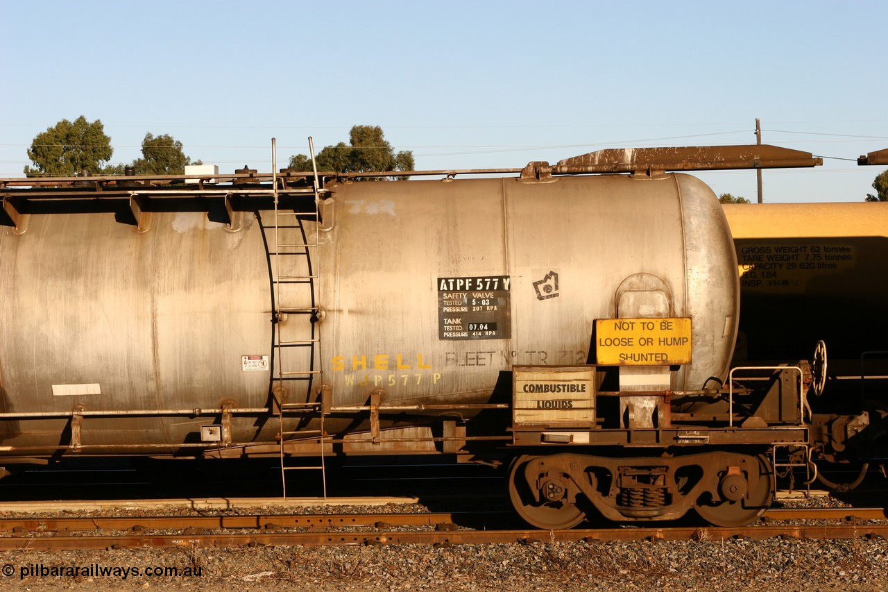 060528 4657
West Kalgoorlie, ATPF 577 fuel tank waggon built by WAGR Midland Workshops 1974 for Shell as type WJP, 80.66 kL one compartment one dome, capacity of 80500 litres, fitted with type F InterLock couplers Shell Fleet no. TR712.
Keywords: ATPF-type;ATPF577;WAGR-Midland-WS;WJP-type;