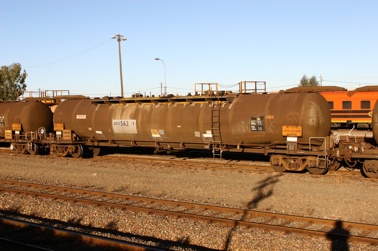 060528 4660
West Kalgoorlie, ATLF 562 tank waggon, built by WAGR Midland Workshops 1973 for Shell as type WJL 86.49 kL one compartment one dome with a capacity of 80500 litres, fitted with type F InterLock couplers.
Keywords: ATLF-type;ATLF562;WAGR-Midland-WS;WJL-type;