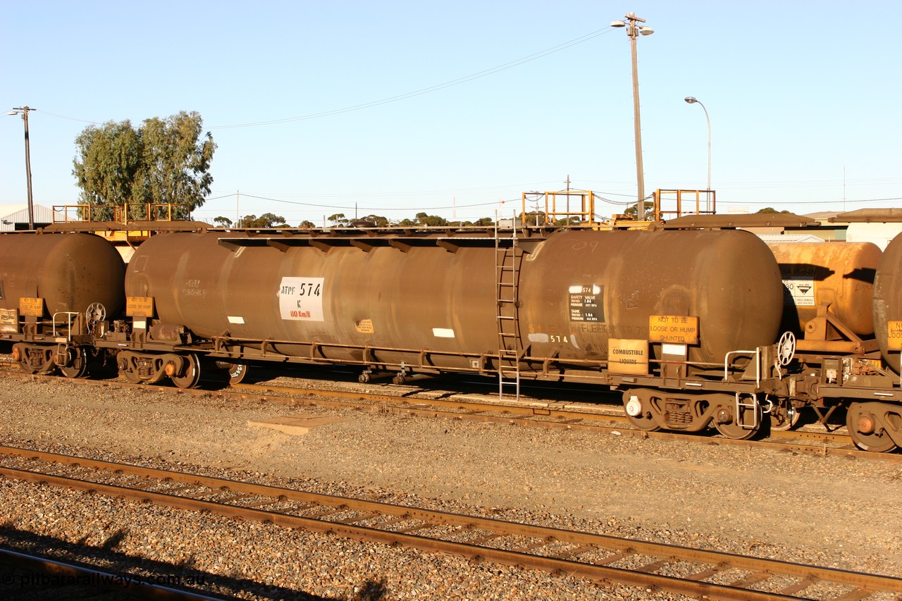 060528 4661
West Kalgoorlie, ATPF 574 fuel tanker, one of nine built by WAGR Midland Workshops in 1974 for Shell as type WJP, 80.66 kL one compartment one dome, original code and fleet no. TR709, with a capacity now of 80000 litres.
Keywords: ATPF-type;ATPF574;WAGR-Midland-WS;WJP-type;