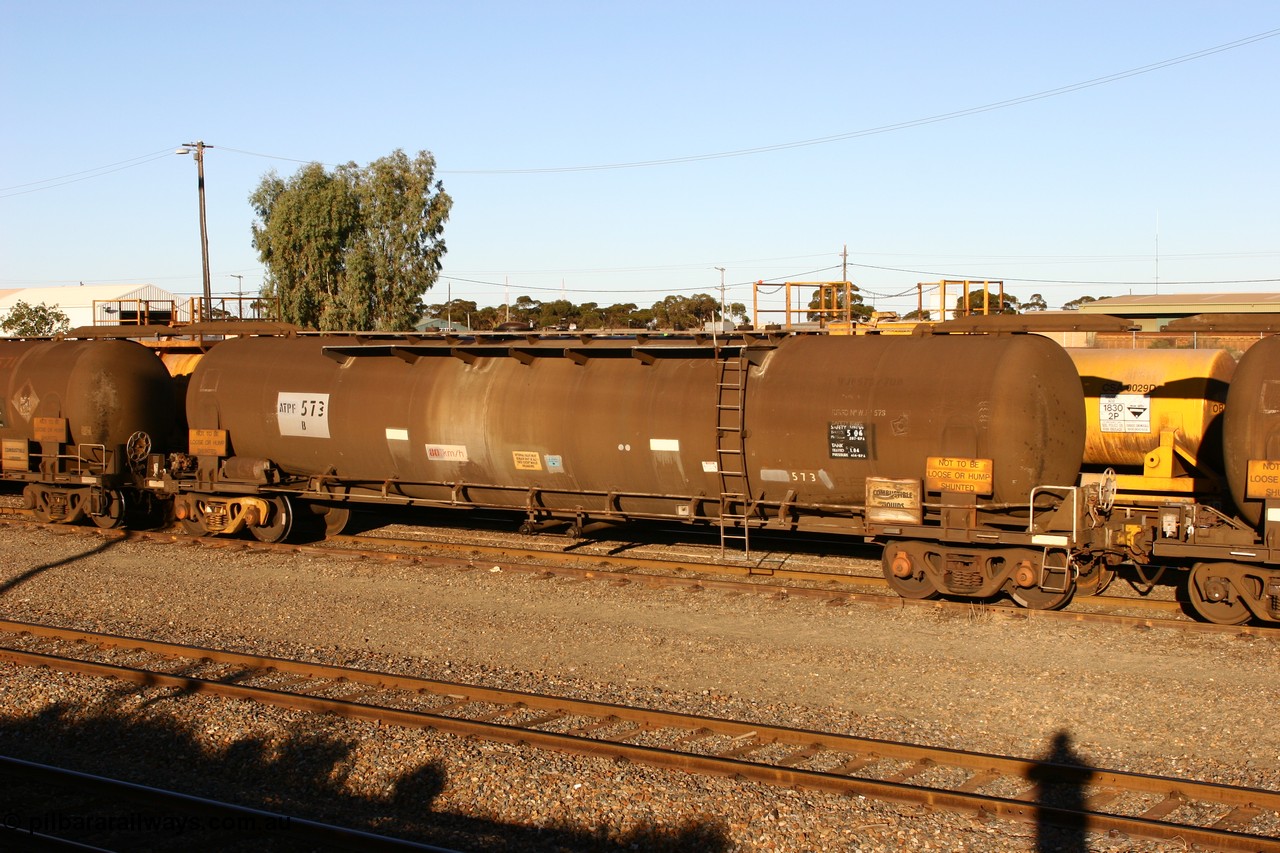 060528 4662
West Kalgoorlie, ATPF 573 fuel tank waggon built by WAGR Midland Workshops 1974 for Shell as WJP type 80.66 kL one compartment one dome, capacity of 80500 litres, Shell Fleet No. 708.
Keywords: ATPF-type;ATPF573;WAGR-Midland-WS;WJP-type;
