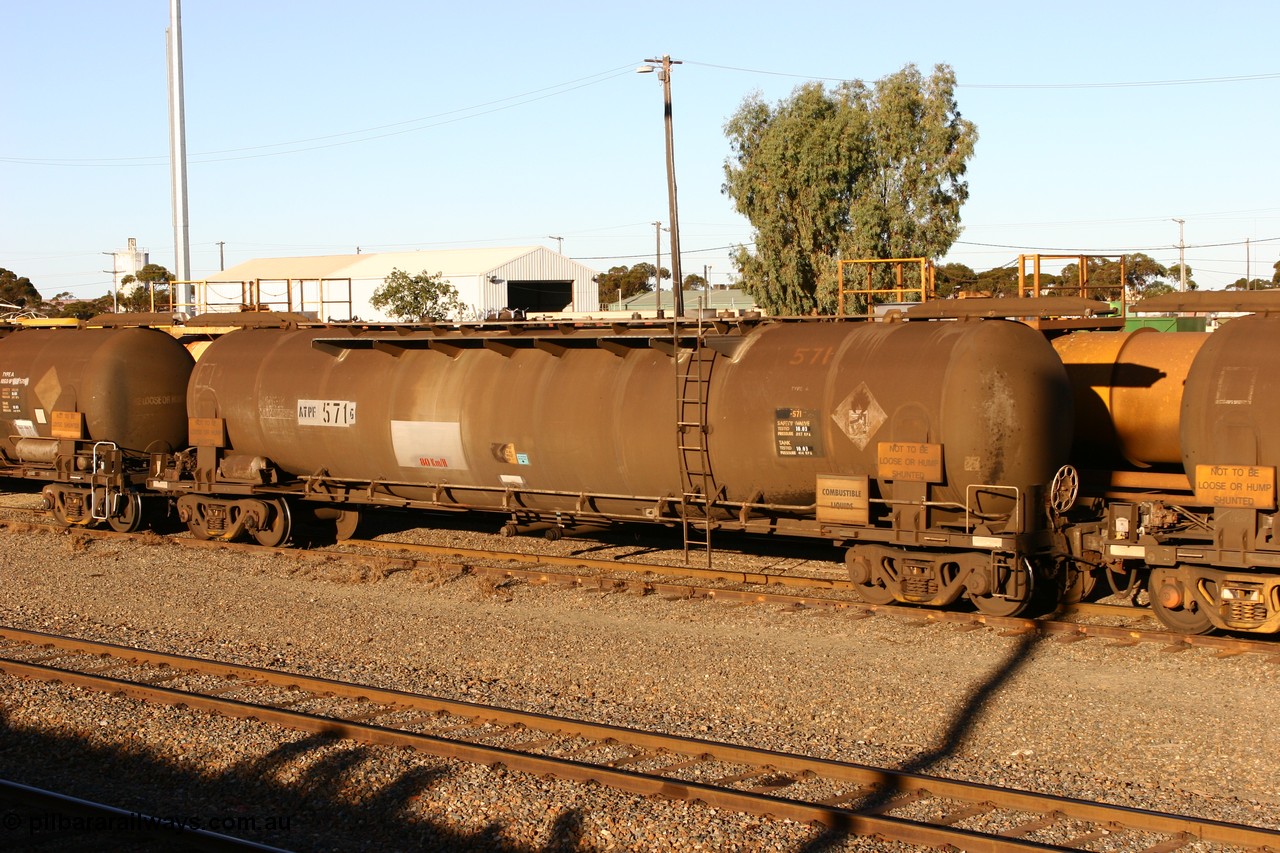 060528 4663
West Kalgoorlie, ATPF 571 fuel tank waggon is the type leader built by WAGR Midland Workshops in 1974 for Shell as WJP type 80.66 kL one compartment one dome, capacity of 80500 litres.
Keywords: ATPF-type;ATPF571;WAGR-Midland-WS;WJP-type;