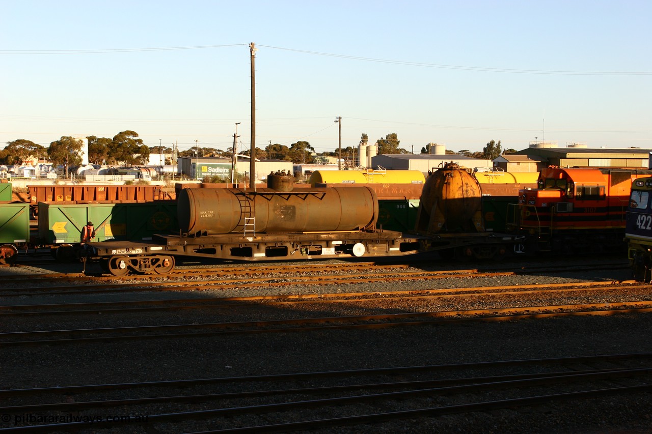 060528 4679
West Kalgoorlie, AZWY 30373 'Sputnik' loco oil and sand waggon, originally built as an WFX type flat waggon by Tomlinson Steel in a batch of one hundred and sixty one in 1969-70. Recoded to WQCX type in 1980 and to WSP type waste oil and sand waggon in 1986.
Keywords: AZWY-type;AZWY30373;Tomlinson-Steel-WA;WFX-type;WQCX-type;WSP-type;