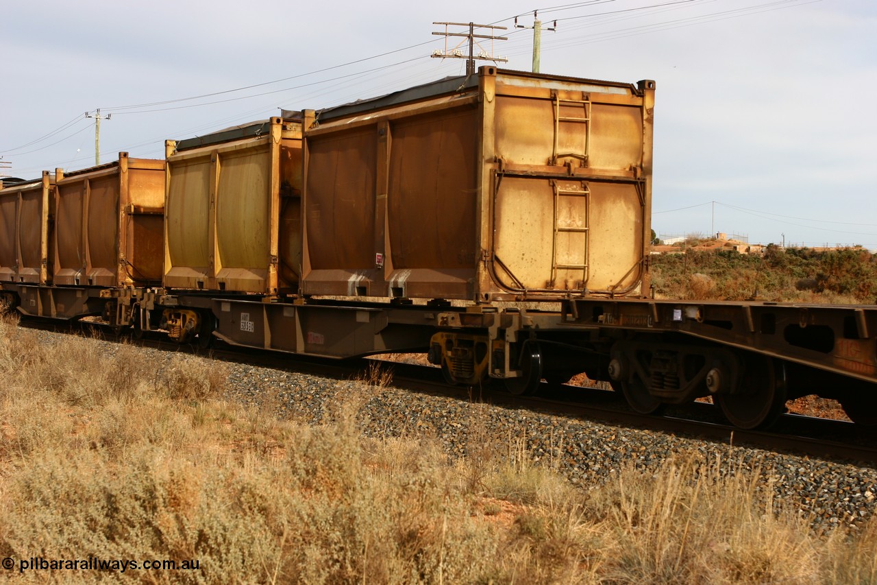 060531 4982
West Kalgoorlie, AQNY 32153 one of sixty two waggons built by Goninan WA in 1998 as WQN type for Murrin Murrin container traffic with two original style sulphur containers S155 and an unnumbered one with sliding tarpaulin roofs.
Keywords: AQNY-type;AQNY32153;Goninan-WA;WQN-type;