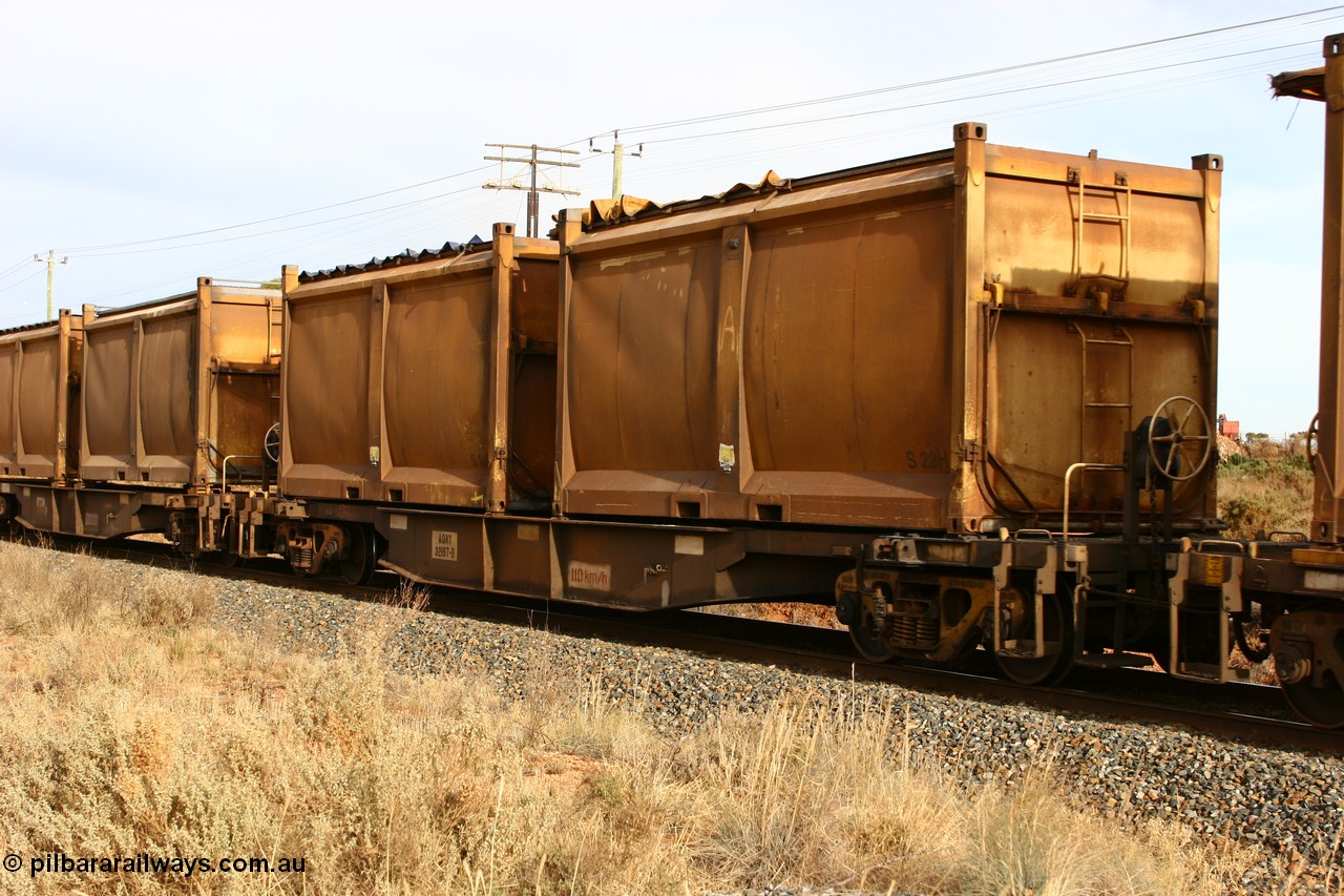 060531 4987
West Kalgoorlie, AQNY 32197 one of sixty two waggons built by Goninan WA in 1998 as WQN class for Murrin Murrin container traffic, with sulphur skips S22 and S10 with original door and sliding tarpaulins.
Keywords: AQNY-type;AQNY32197;Goninan-WA;WQN-type;