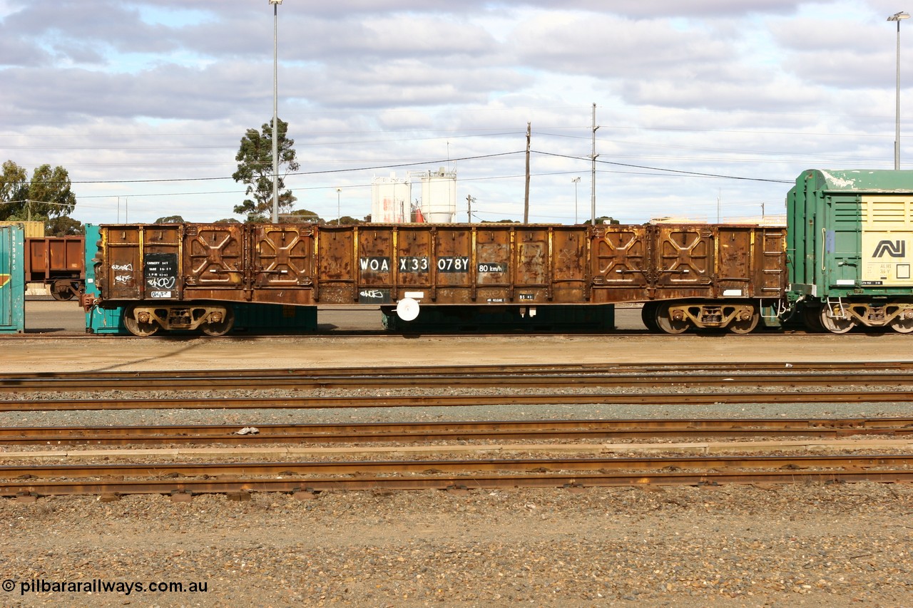 070527 9220
West Kalgoorlie, WOAX 33078 open waggon originally built by WAGR Midland Workshops in a batch of one hundred WG type open waggons in 1966-67, recoded to WGX in 1969, in 1970 converted to WGS type for superphosphate traffic, in 1980 recoded to WOAX.
Keywords: WOAX-type;WOAX33078;WAGR-Midland-WS;WGX-type;WGS-type;