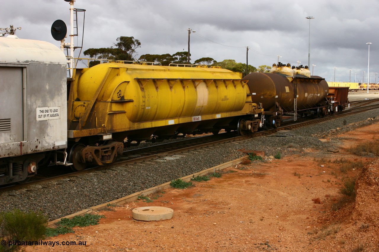 070528 9295
West Kalgoorlie, WN 5##, pneumatic discharge nickel concentrate waggon, one of thirty built by AE Goodwin NSW as WN type in 1970 for WMC.
Keywords: WN-type;AE-Goodwin;