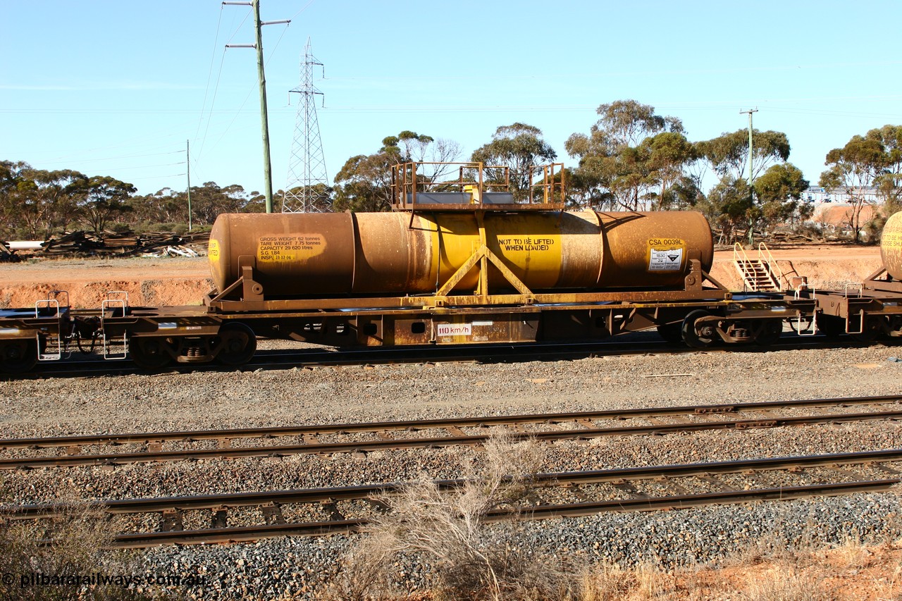 070529 9336
West Kalgoorlie, AQHY 30053 with sulphuric acid tank CSA 0039, originally built by the WAGR Midland Workshops in 1964/66 as a WF type flat waggon, then in 1997, following several recodes and modifications, was one of seventy five waggons converted to the WQH type to carry CSA sulphuric acid tanks between Hampton/Kalgoorlie and Perth/Kwinana.
Keywords: AQHY-type;AQHY30053;WAGR-Midland-WS;WF-type;WFDY-type;WFDF-type;RFDF-type;WQH-type;