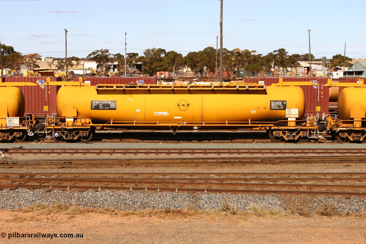070529 9408
West Kalgoorlie, ATBY 14590 fuel tank waggon built by Westrail Midland Workshops in a batch of nine in 1981-82 for Bain Leasing Pty Ltd as type JPB, 82,000 litres for narrow gauge, recoded to JPBA in 1986, converted to standard gauge as WJPB.
Keywords: ATBY-type;ATBY14590;Westrail-Midland-WS;JPB-type;JPBA-type;WJPB-type;