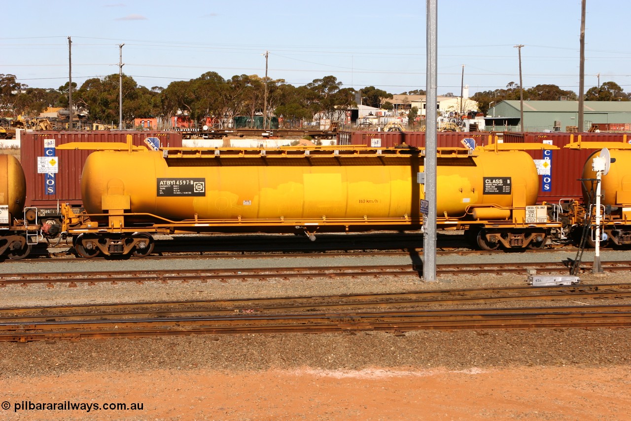 070529 9409
West Kalgoorlie, ATBY 14597 fuel tank waggon built by Westrail Midland Workshops in a batch of nine in 1981 for Bain Leasing Pty Ltd as type JPB, 82,000 litres but 14591 was issued to standard gauge as WJPB type, in 1986 it was converted to narrow gauge as JPBA type.
Keywords: ATBY-type;ATBY14597;Westrail-Midland-WS;WJPB-type;JPBA-type;