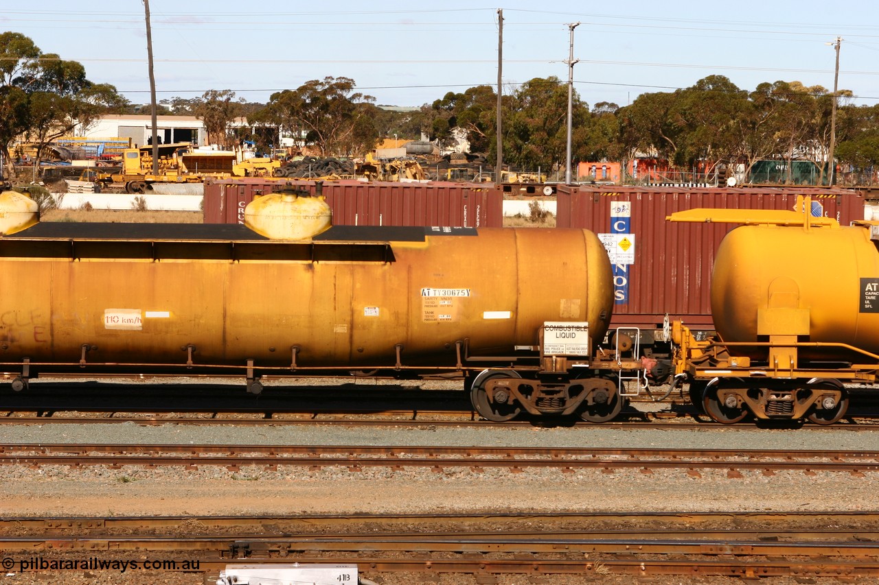 070529 9411
West Kalgoorlie, ATTY 30675 fuel tank waggon, one of five built by AE Goodwin NSW in 1970/71 as WST class, recoded to WSTY and then ATTY. 78600 litre capacity.
Keywords: ATTY-type;ATTY30675;AE-Goodwin;WST-type;WSTY-type;