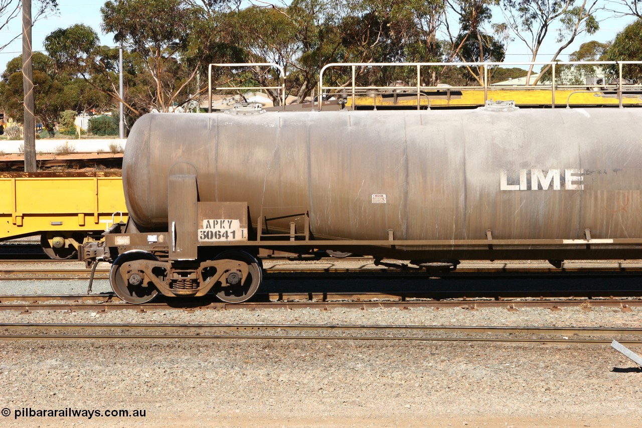 070531 9712
West Kalgoorlie, APKY 30641, leader of two waggons built by WAGR Midland Workshops in 1970 as WK type pneumatic discharge bulk cement waggon, non-handbrake end.
Keywords: APKY-type;APKY30641;WAGR-Midland-WS;WK-type;
