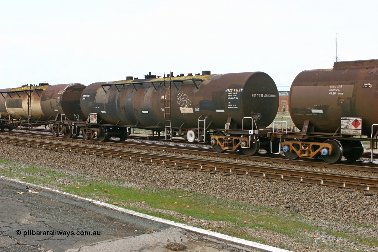 070608 0110
Midland, ATEY 7312 fuel tank waggon, ex NSW and former NTAF in service carting petrol for BP Oil, former AMPOL tank, coded WTEY when arrived in WA.
Keywords: ATEY-type;ATEY7312;NTAF-type;WTEY-type;