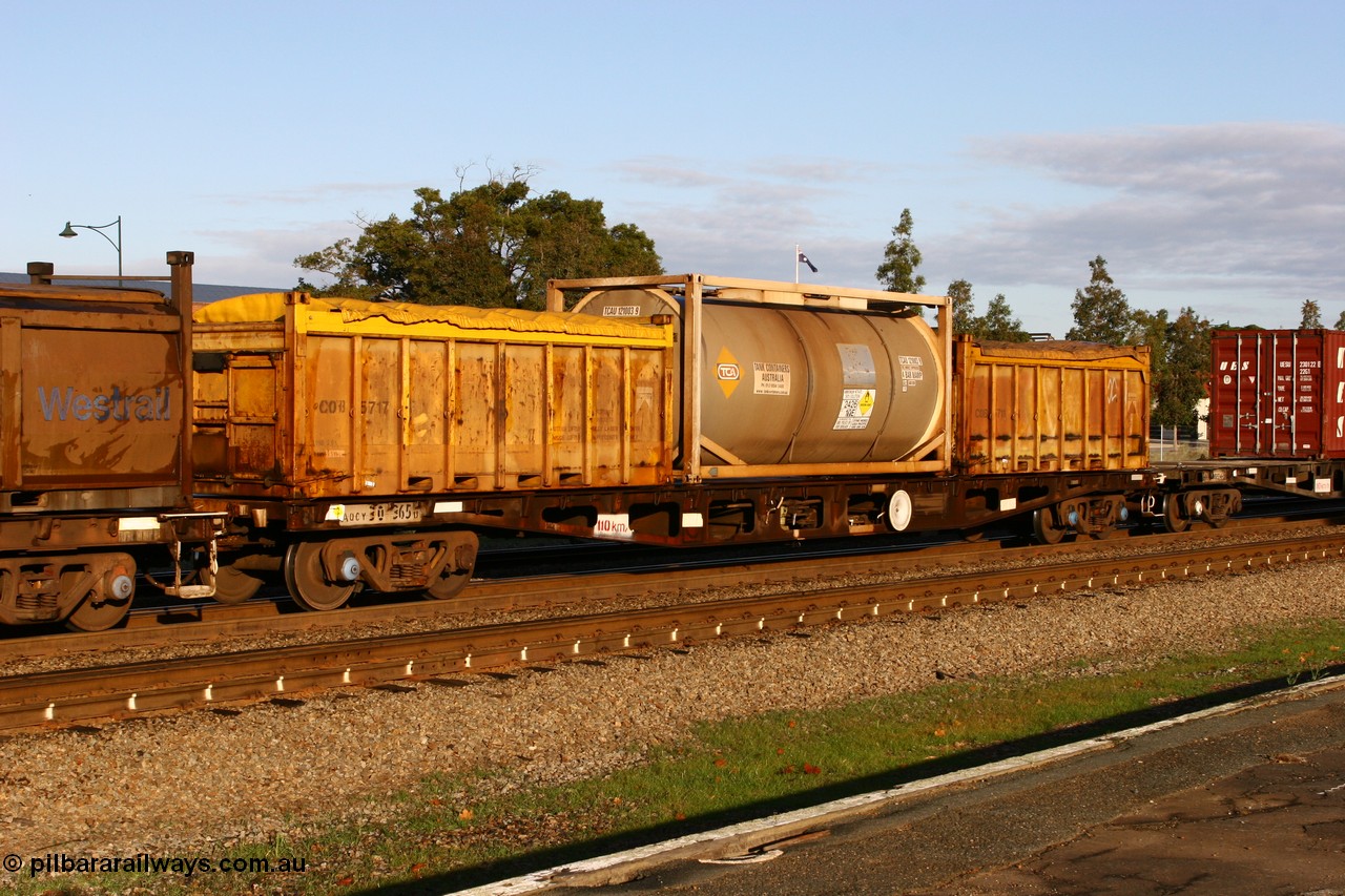 070609 0182
Midland, AQCY 30365 container waggon, one of one hundred and sixty one units built by Tomlinson Steel WA in 1969-70 as WFX type, recoded to WQCX in 1980, loaded with two Westrail COB type 20' tarp top containers COB 5717 and COB 5711 with 20' ISO Tank Containers Australia tanktainer TCAU 121003 for ammonium nitrate emulsion.
Keywords: AQCY-type;AQCY30365;Tomlinson-Steel-WA;WFX-type;WQCX-type;