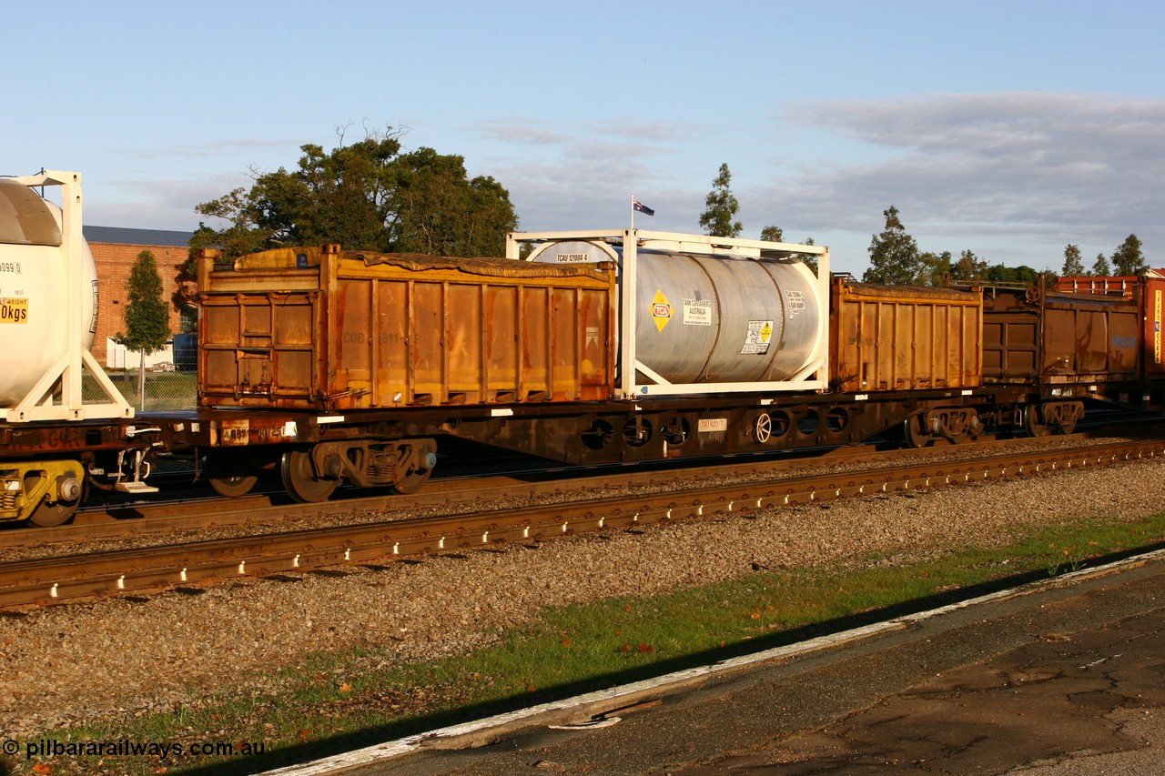 070609 0183
Midland, AQBY 30125 75' flat waggon, one of six built by Comeng NSW in 1970 as WFCX type flat waggon, recoded to WQBX in 1980. Loaded with two Westrail 20' COB type tarp top containers COB 5811 and COB 5829 and 20' ISO Tank Containers Australia tanktainer TCAU 121004 for ammonium nitrate emulsion.
Keywords: AQBY-type;AQBY30125;Comeng-NSW;WFCX-type;WQBX-type;