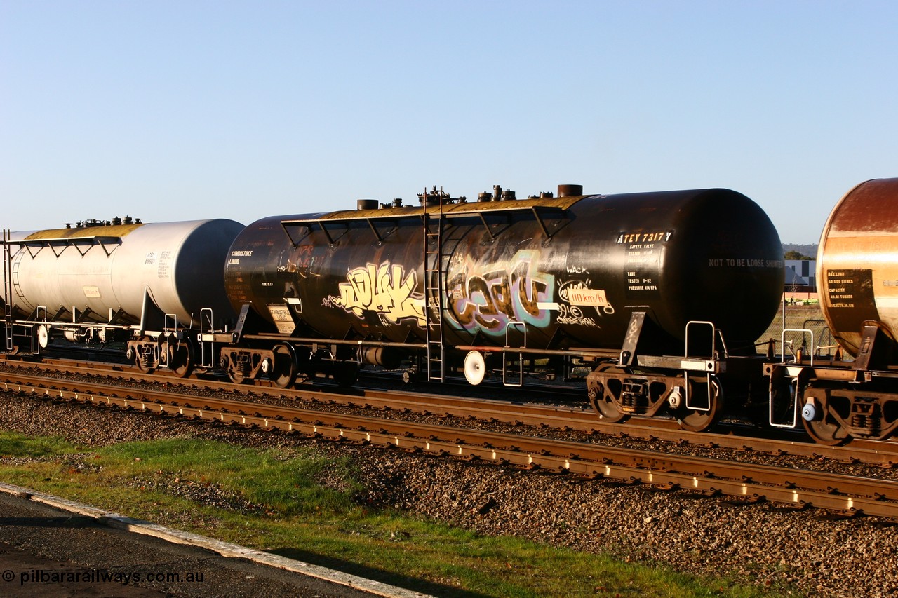 070609 0192
Midland, ATEY 7317 diesel fuel tank waggon in service for BP Oil, former NSW AMPOL NTAF tank, coded WTEY when arrived in WA.
Keywords: ATEY-type;ATEY7317;NTAF-type;WTEY-type;