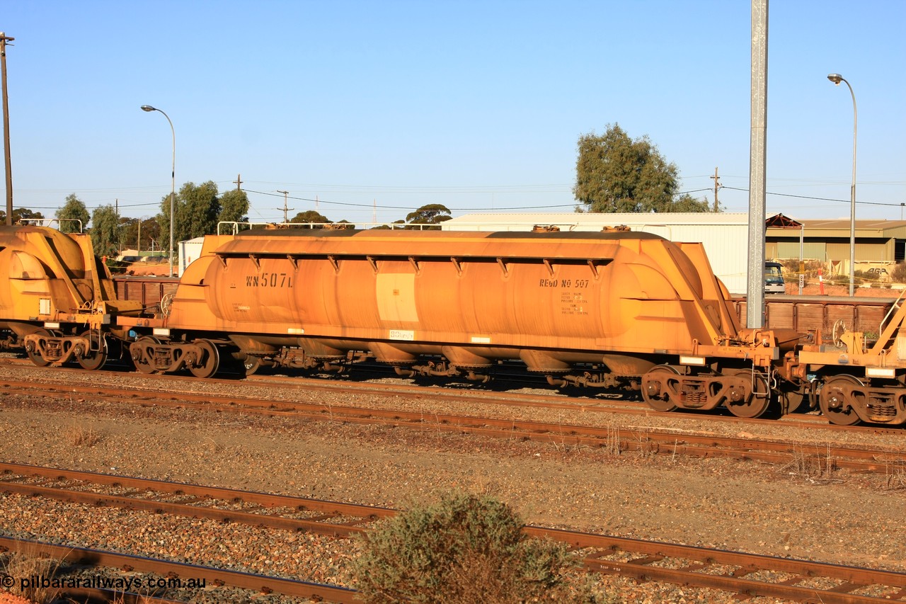 100601 8483
West Kalgoorlie, WN 507, pneumatic discharge nickel concentrate waggon, one of thirty units built by AE Goodwin NSW as WN type in 1970 for WMC.
Keywords: WN-type;WN507;AE-Goodwin;
