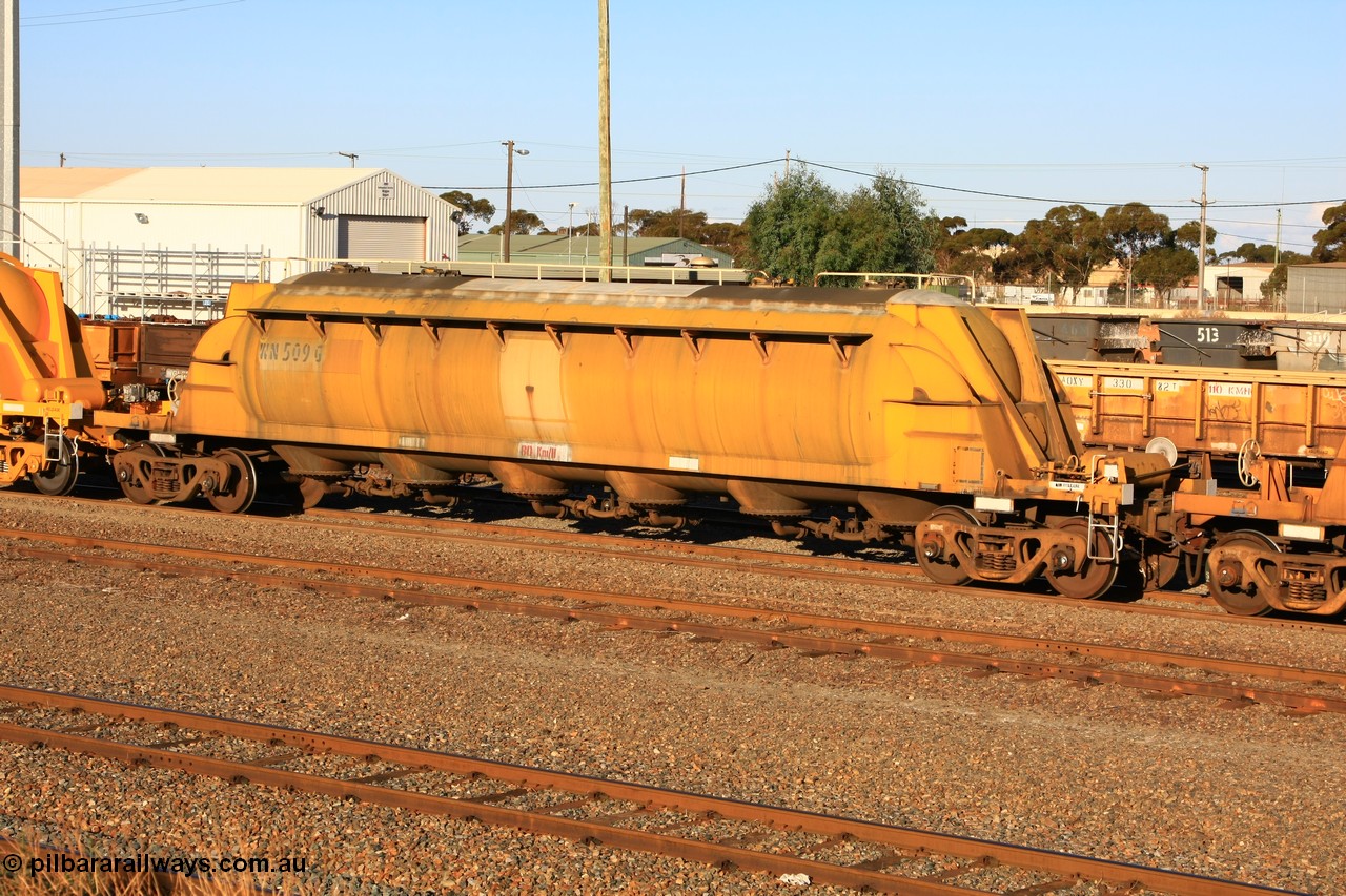 100601 8489
West Kalgoorlie, WN 509, pneumatic discharge nickel concentrate waggon, one of thirty units built by AE Goodwin NSW as WN type in 1970 for WMC.
Keywords: WN-type;WN509;AE-Goodwin;