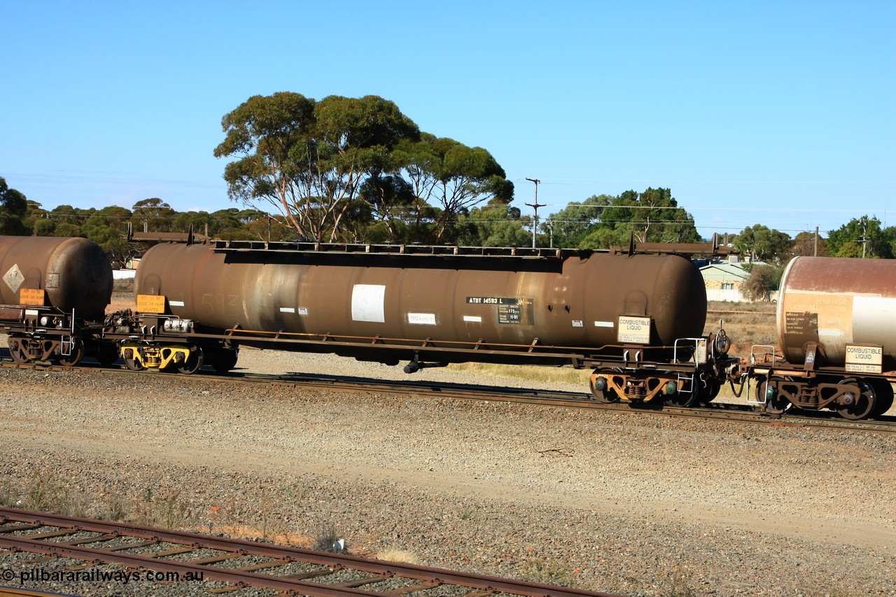 100602 8597
West Kalgoorlie, ATBY 14593 fuel tanker, one of nine JPB type tankers built for Bain Leasing Pty Ltd by Westrail Midland Workshops in 1981/82 for narrow gauge recoded to JPBA, converted to standard gauge as WJPB. 82000 litre capacity, with a 75000 SF limit.
Keywords: ATBY-type;ATBY14593;Westrail-Midland-WS;JPB-type;WJPB-type;JPBA-type;