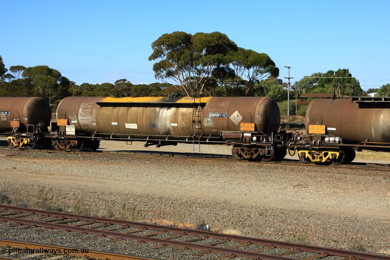 100602 8598
West Kalgoorlie, diesel fuel tank waggon ATPY 587 built by Westrail Midland Workshops in 1978 for Mobil, later sold to BP, as type WJP then recoded to WJPY, 80.66 kL one compartment one dome, original code and fleet no. visible, with a capacity now of 80000 litres.
Keywords: ATPY-type;ATPY587;WAGR-Midland-WS;WJP-type;WJPY-type;