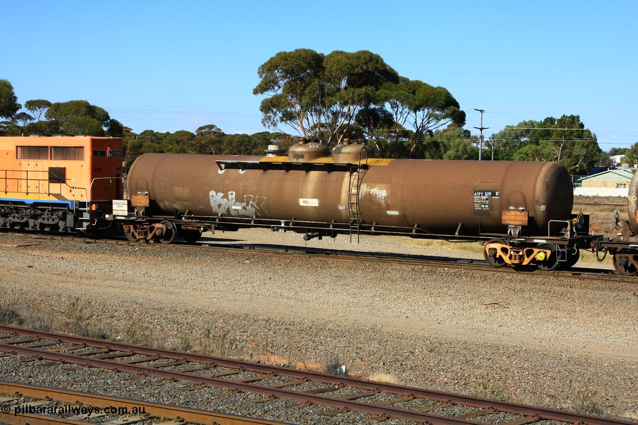 100602 8599
West Kalgoorlie, ATFY 509 fuel tank waggon built by Tulloch Ltd NSW in 1970 for Mobil WA as a WJF type, 96.24 kilolitres, 1 compartment and 2 domes. Recoded to WJFY, sold to BP Oil in 1985.
Keywords: ATFY-type;ATFY509;Tulloch-Ltd-NSW;WJF-type;WJFY-type;