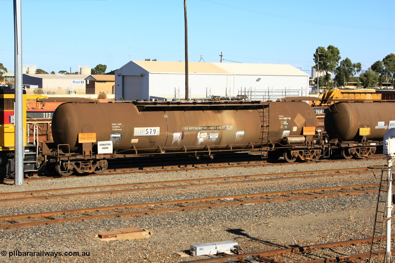 100602 8667
West Kalgoorlie, ATPF 579 fuel tank waggon built by WAGR Midland Workshops 1974 for Shell as WJP type 80.66 kL one compartment one dome, fitted with type F InterLock couplers.
Keywords: ATPF-type;ATPF579;WAGR-Midland-WS;WJP-type;