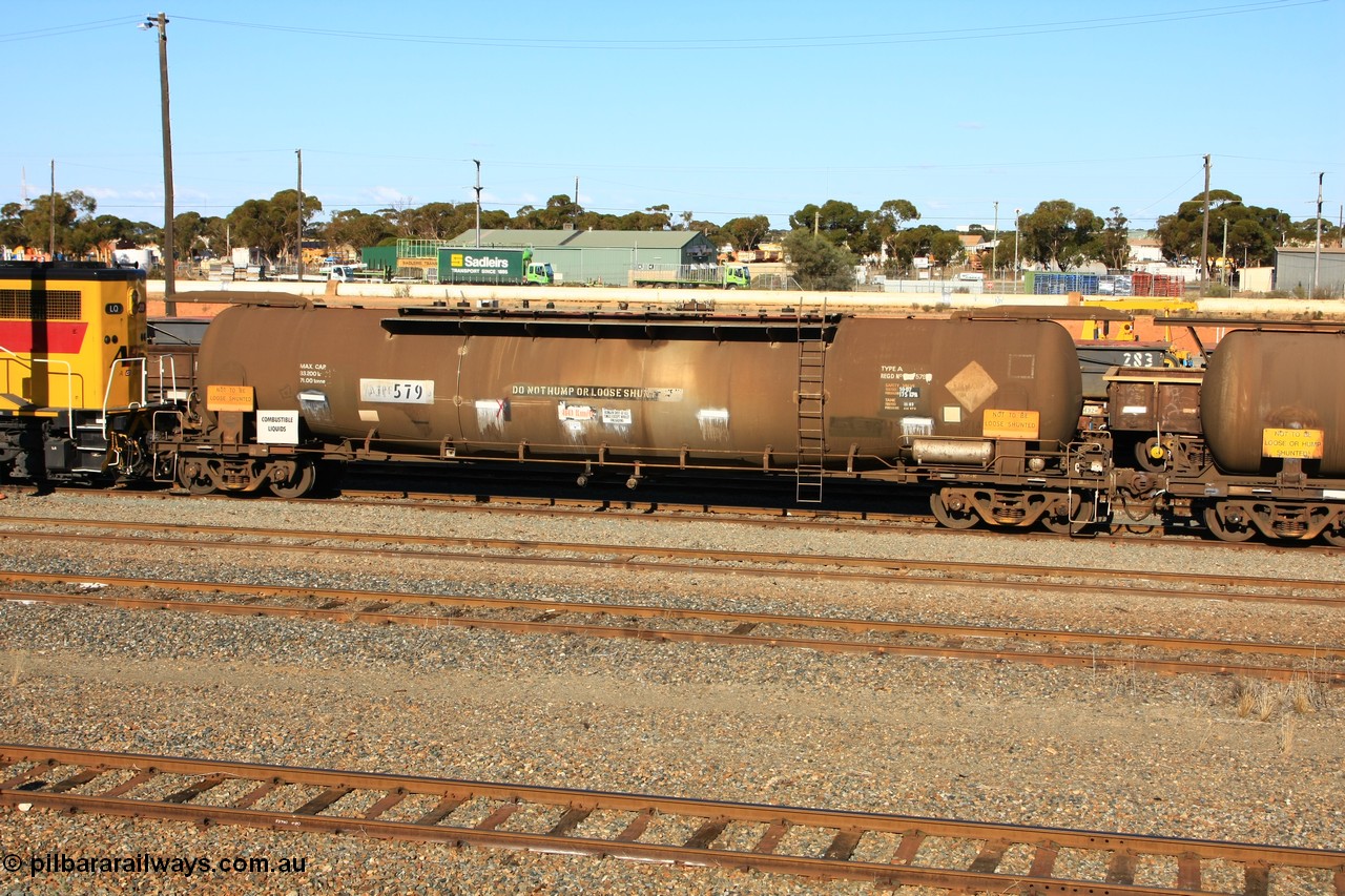 100602 8669
West Kalgoorlie, ATPF 579 fuel tank waggon built by WAGR Midland Workshops 1974 for Shell as WJP type 80.66 kL one compartment one dome, fitted with type F InterLock couplers.
Keywords: ATPF-type;ATPF579;WAGR-Midland-WS;WJP-type;