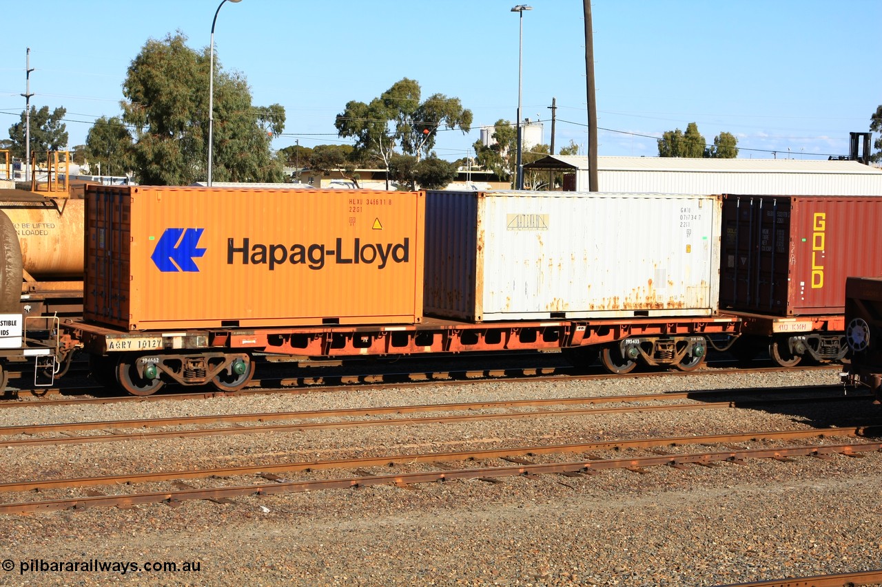 100602 8676
West Kalgoorlie, AQRY 1012, part of a bar coupled pair, ex AFRF type two-pack rail transport waggon, last used on the Darwin line. Loaded with two 20' 22G1 type containers, Hapag-Lloyd HLXU 346611 and Gateway GATU 076734.
Keywords: AQRY-type;AQRY1012;AFRF-type;
