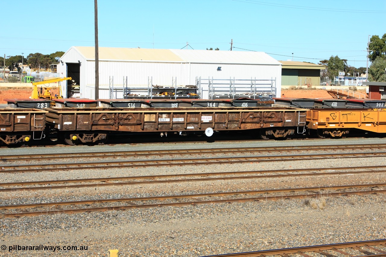 100603 8861
West Kalgoorlie, AOXY 33123, converted to carry nickel matte bulk bags, in WGL traffic. Built by WAGR Midland Workshops in 1969 as part of a batch of fifty eight WGX type open waggons, in 1981 to WOAX, then AOAY type.
Keywords: AOXY-type;AOXY33123;WAGR-Midland-WS;WGX-type;WOAX-type;