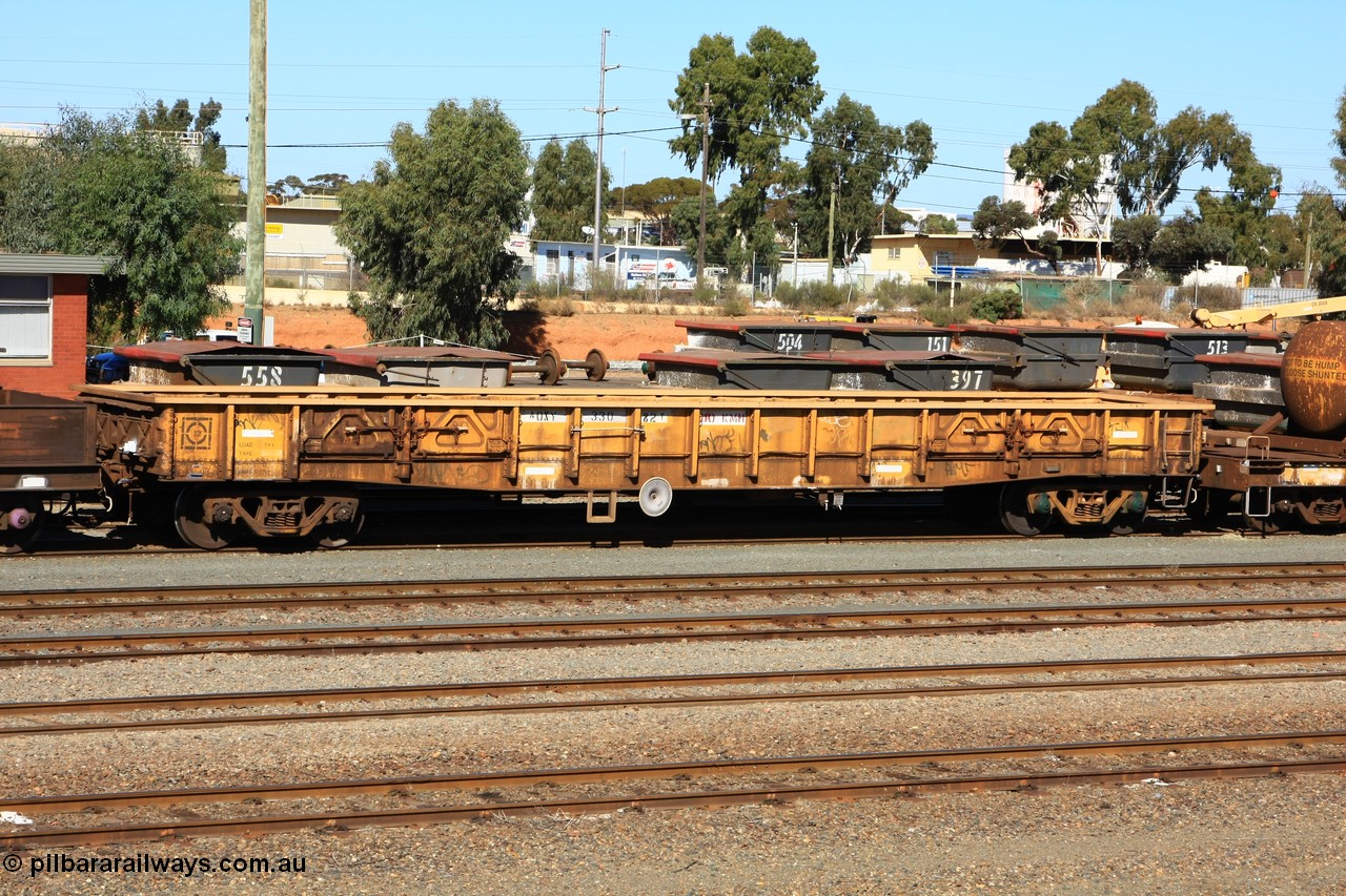 100603 8864
West Kalgoorlie, AOXY 33082, converted to carry nickel matte bulk bags, in WGL traffic. Built by WAGR Midland Workshops in 1969 as part of a batch of one hundred WG type open waggons, reclassed as a group in 1969 to WGX, to WGS for superphosphate traffic then in 1981 to WOAX, then AOAY type. [url=https://pilbararailways.com.au/gallery/displayimage.php?pid=7354]Image here of it as AOAY in 2007[/url].
Keywords: AOXY-type;AOXY33082;WAGR-Midland-WS;WG-type;WGX-type;WGS-type;WOAX-type;AOAY-type;