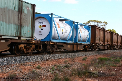 060117 2716
Bardoc, AQNY 32197, one of sixty two waggons built by Goninan WA in 1998 as WQN type for Murrin Murrin container traffic, with two Degussa 20' tank tainers DWAU 137030 and a similar unit, train 2029 loaded Malcolm freighter.
Keywords: AQNY-type;AQNY32197;Goninan-WA;WQN-type;