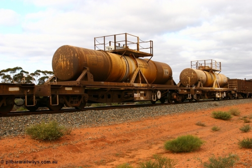 060527 4093
Scotia, AQHY 30050 with sulphuric acid tank CSA 0063, originally built by the WAGR Midland Workshops in 1964/66 as a WF type flat waggon, then in 1997, following several recodes and modifications, was one of seventy five waggons converted to the WQH type to carry CSA sulphuric acid tanks between Hampton/Kalgoorlie and Perth/Kwinana.
Keywords: AQHY-type;AQHY30050;WAGR-Midland-WS;WF-type;WFDY-type;WFDF-type;RFDF-type;WQH-type;