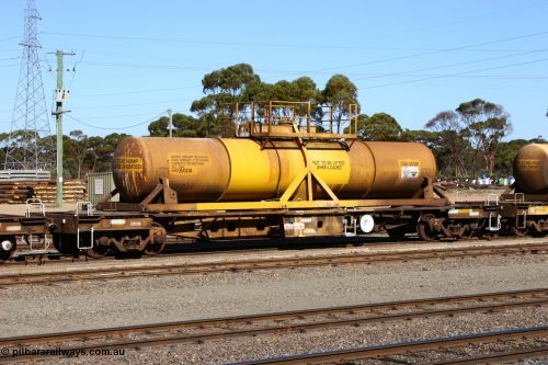 060528 4413
West Kalgoorlie, AQHY 30004 with sulphuric acid tank CSA 0015, originally built by the WAGR Midland Workshops in 1964/66 as a WF type flat waggon, then in 1997, following several recodes and modifications, was the lowest of seventy five waggons converted to the WQH type to carry CSA sulphuric acid tanks between Hampton/Kalgoorlie and Perth/Kwinana.
Keywords: AQHY-type;AQHY30004;WAGR-Midland-WS;WF-type;WFDY-type;WFDF-type;RFDF-type;WQH-type;