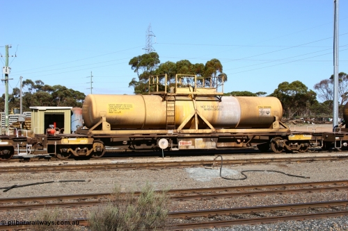 060528 4417
West Kalgoorlie, AQHY 30097 with sulphuric acid tank CSA 0008, originally built by the WAGR Midland Workshops in 1964/66 as a WF type flat waggon, then in 1997, following several recodes and modifications, was one of seventy five waggons converted to the WQH type to carry CSA sulphuric acid tanks between Hampton/Kalgoorlie and Perth/Kwinana.
Keywords: AQHY-type;AQHY30097;WAGR-Midland-WS;WF-type;WFP-type;WFDY-type;WFDF-type;RFDF-type;WQH-type;