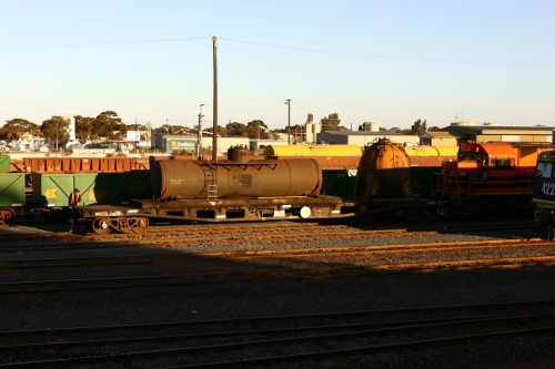 060528 4679
West Kalgoorlie, AZWY 30373 'Sputnik' loco oil and sand waggon, originally built as an WFX type flat waggon by Tomlinson Steel in a batch of one hundred and sixty one in 1969-70. Recoded to WQCX type in 1980 and to WSP type waste oil and sand waggon in 1986.
Keywords: AZWY-type;AZWY30373;Tomlinson-Steel-WA;WFX-type;WQCX-type;WSP-type;