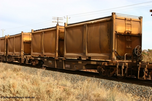 060531 4988
West Kalgoorlie, AQNY 32189 one of sixty two waggons built by Goninan WA in 1998 as WQN type for Murrin Murrin container traffic, with sulphur skips S74 and S7 with original door and sliding tarpaulins.
Keywords: AQNY-type;AQNY32189;Goninan-WA;WQN-type;