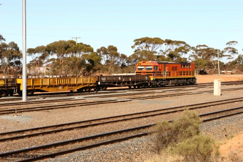 070529 9327
West Kalgoorlie, WGLA 30027 originally built by WAGR Midland Workshops in 1965 as WF type bogie flat waggon, to WFW in 1974, then converted to bagged nickel matte traffic WGLA type in 1984 and WGL 632 originally one of three units built by Westrail Midland Workshops in 1976-7 as WGL type bogie flat waggon for Western Mining Corporation for bagged nickel matte traffic.
Keywords: WGLA-type;WGLA30027;WAGR-Midland-WS;WF-type;WFW-type;WFDY-type;