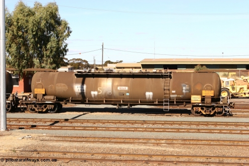 070529 9421
West Kalgoorlie, ATPF 578 fuel tank waggon, originally built by WAGR Midland Workshops in 1974 for Shell as type WJP, it also spent time in SA in 1985, 80.66 kL one compartment one dome, capacity of 80350 litres, fitted with type F InterLock couplers.
Keywords: ATPF-type;ATPF578;WAGR-Midland-WS;WJP-type;