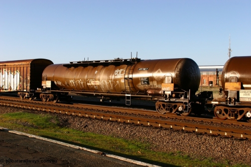 070609 0201
Midland, ATPY 592 fuel tank waggon built by WAGR Midland Workshops in 1976 as one of four WJP type for AMPOL, capacity of 80500 litres, here in Caltex service.
Keywords: ATPY-type;ATPY592;WAGR-Midland-WS;WJP-type;WJPY-type;