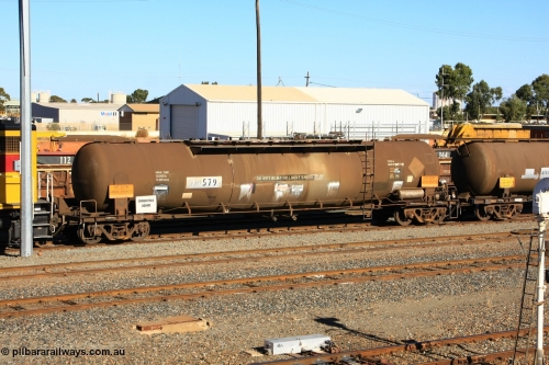 100602 8667
West Kalgoorlie, ATPF 579 fuel tank waggon built by WAGR Midland Workshops 1974 for Shell as WJP type 80.66 kL one compartment one dome, fitted with type F InterLock couplers.
Keywords: ATPF-type;ATPF579;WAGR-Midland-WS;WJP-type;