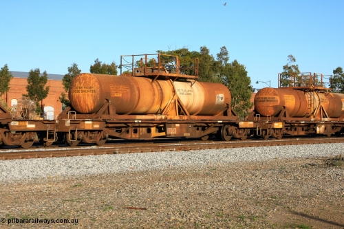 100609 09928
Midland, AQHY 30089 with sulphuric acid tank CSA 0038, originally built by the WAGR Midland Workshops in 1964/66 as a WF type flat waggon, then in 1997, following several recodes and modifications, was one of seventy five waggons converted to the WQH type to carry CSA sulphuric acid tanks between Hampton/Kalgoorlie and Perth/Kwinana.
Keywords: AQHY-type;AQHY30089;WAGR-Midland-WS;WF-type;WFDY-type;WFDF-type;RFDF-type;WQH-type;