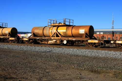 100609 09929
Midland, AQHY 30011 with sulphuric acid tank CSA 002, originally built by the WAGR Midland Workshops in 1964/66 as a WF type flat waggon, then in 1997, following several recodes and modifications, was one of seventy five waggons converted to the WQH type to carry CSA sulphuric acid tanks between Hampton/Kalgoorlie and Perth/Kwinana.
Keywords: AQHY-type;AQHY30011;WAGR-Midland-WS;WF-type;WFDY-type;WFDF-type;WQH-type;