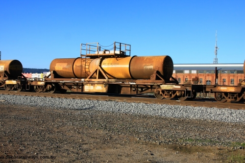 100609 09931
Midland, AQHY 30056 with sulphuric acid tank CSA 0041, originally built by the WAGR Midland Workshops in 1964/66 as a WF type flat waggon, then in 1997, following several recodes and modifications, was one of seventy five waggons converted to the WQH to carry CSA sulphuric acid tanks between Hampton/Kalgoorlie and Perth/Kwinana.
Keywords: AQHY-type;AQHY30056;WAGR-Midland-WS;WF-type;WFDY-type;WFDF-type;RFDF-type;WQH-type;