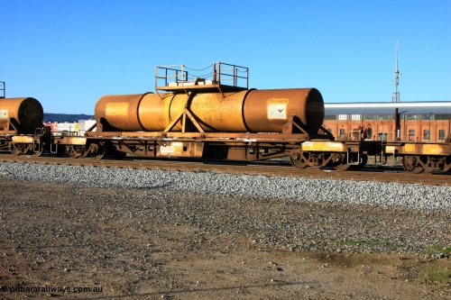 100609 09933
Midland, AQHY 30059 with sulphuric acid tank CSA 0062, originally built by the WAGR Midland Workshops in 1964/66 as a WF type flat waggon, then in 1997, following several recodes and modifications, was one of seventy five waggons converted to the WQH to carry CSA sulphuric acid tanks between Hampton/Kalgoorlie and Perth/Kwinana.
Keywords: AQHY-type;AQHY30059;WAGR-Midland-WS;WF-type;WFL-type;WFDY-type;WFDF-type;RFDF-type;WQH-type;